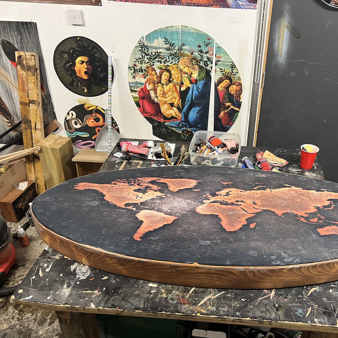 WORLD MAP Elliptical Wood Beam Glass Top Coffee Table - Image 6